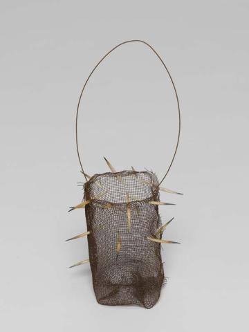 Artwork Narrbong (String bag) this artwork made of Rusted gauze wire with echidna quills