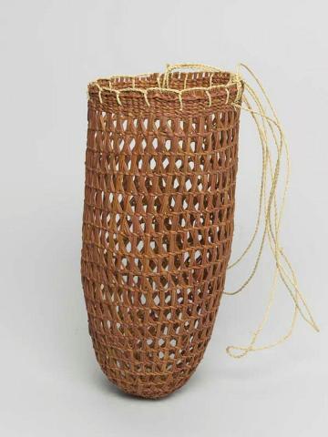 Artwork Burlurpurr (Conical basket) this artwork made of Twined pandanus palm leaf, natural dyes with bark fibre string, created in 2006-01-01