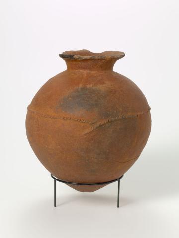 Artwork Jar this artwork made of Earthenware, hand-built spherical form with flaring lip and applied rope motif around the body