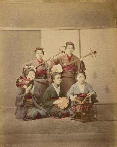 Artwork (Geisha performers) (from 'Japan' album) this artwork made of Hand-coloured albumen photograph on board (originally bound in an album), created in 1870-01-01