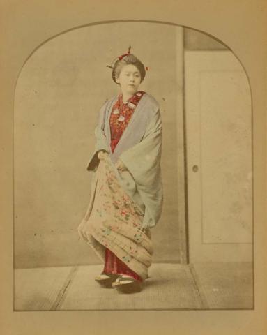 Artwork (Geisha wearing watairi (winter) kimono) (from 'Japan' album) this artwork made of Hand-coloured albumen photograph on board (originally bound in an album), created in 1870-01-01