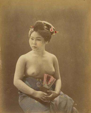 Artwork (Bare-breasted geisha) (from 'Japan' album) this artwork made of Hand-coloured albumen photograph on board (originally bound in an album), created in 1870-01-01