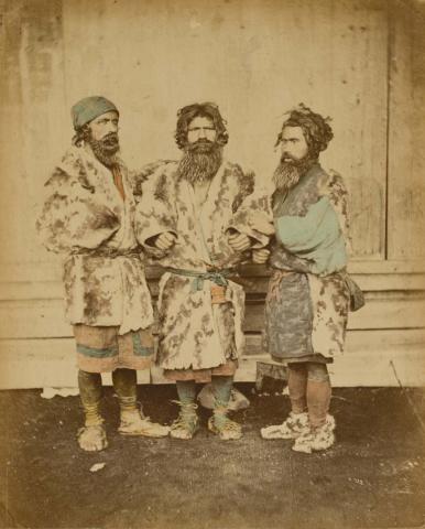 Artwork (Ainu elders, Yezu, Hokkaido) (from 'Japan' album) this artwork made of Hand-coloured albumen photograph on board (originally bound in an album), created in 1870-01-01