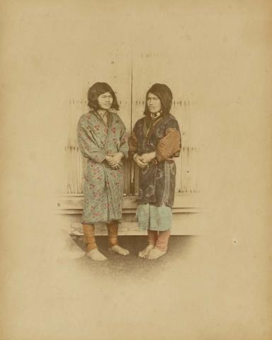 Artwork (Ainu women, Yezu, Hokkaido) (from 'Japan' album) this artwork made of Hand-coloured albumen photograph on board (originally bound in an album), created in 1870-01-01