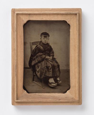 Artwork Portrait of young boy in traditional dress this artwork made of Ambrotype, 1/6 plate