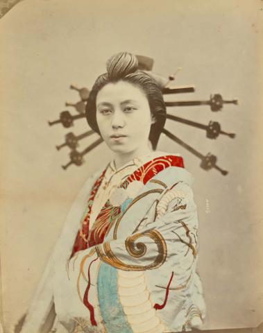 Artwork (Oiran (courtesan)) this artwork made of Large format hand-coloured albumen photograph mounted on card, created in 1877-01-01