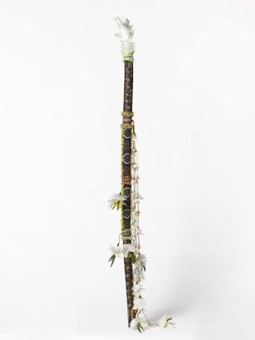 Artwork Banumbirr (Morning Star pole) this artwork made of Wood, bark fibre string, feathers, native beeswax, synthetic polymer paint