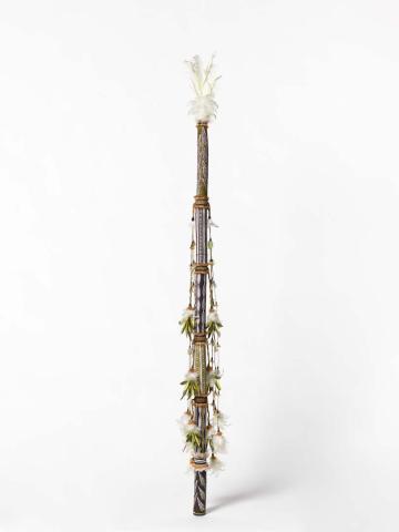 Artwork Banumbirr (Morning Star pole) this artwork made of Wood, bark fibre string, feathers, native beeswax, natural pigments, synthetic polymer paint