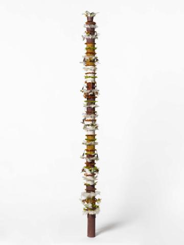 Artwork Banumbirr (Morning Star pole) this artwork made of Wood, bark fibre string, cotton thread, feathers, native beeswax, natural pigments