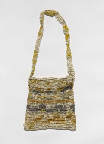 Artwork Sisira esoe (string bag) this artwork made of Looped Tulif (timbak) tree bark fibre with natural dyes