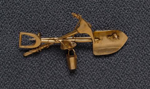 Artwork Goldfields brooch (crossed pick and shovel with bucket) this artwork made of Gold and gold nuggets