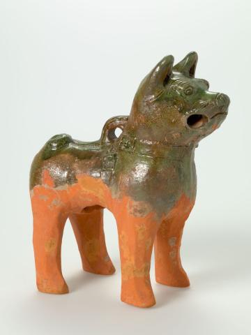 Artwork Dog wearing collar this artwork made of Earthenware, green glaze, incised features