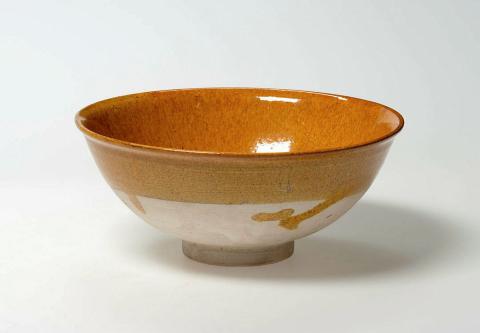 Artwork Bowl this artwork made of Earthenware, amber lead-glaze over cream slip, created in 0907-01-01