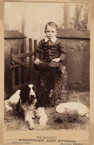 Artwork Boy and dog this artwork made of Albumen photograph on paper mounted on card, created in 1875-01-01