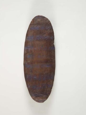 Artwork Shield (South Burnett area) this artwork made of Carved hardwood with natural pigments and Reckitt’s Blue laundry powder
