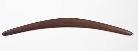 Artwork Fighting boomerang (South West Queensland) this artwork made of Carved and incised hardwood with natural pigment infill