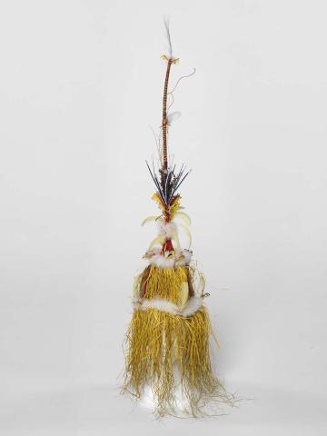 Artwork Ralavon this artwork made of Tokatokoi headdress: shredded sago fibres, dyes, wool, feathers, dried fern over split cane armature and stick, created in 2011-01-01
