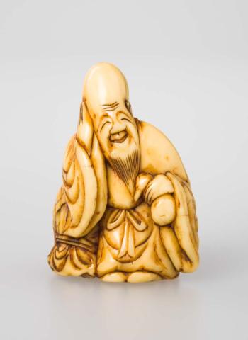 Artwork Netsuke: (Daikoku) this artwork made of Carved ivory, created in 1800-01-01