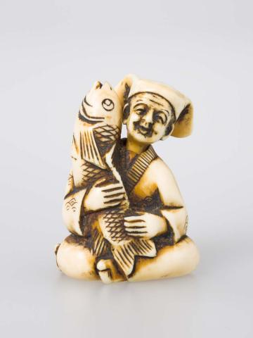 Artwork Netsuke: (Ebisu with fish) this artwork made of Carved ivory, created in 1800-01-01