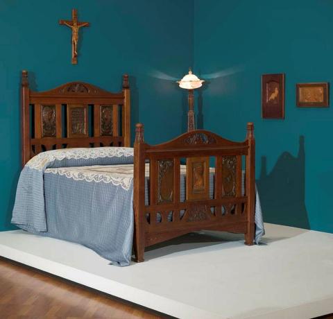 Artwork Bed of Peace this artwork made of Carved silky oak with inset panels in Queensland beech, created in 1919-01-01