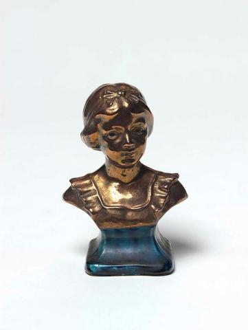 Artwork Head of a girl this artwork made of Earthenware, modelled with bronze lustre glaze and blue glazed plinth, created in 1936-01-01