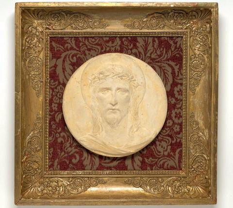 Artwork Head of Christ this artwork made of Plaster plaque, in low relief in moulded wood frame with velvet insert, created in 1946-01-01