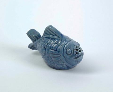 Artwork Pepper shaker this artwork made of Earthenware, modelled in the form of a bloated toad fish. Blue glaze, created in 1920-01-01