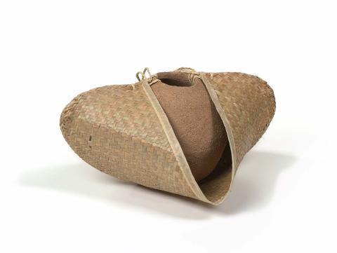Artwork Carry bag this artwork made of Terracotta and clay earthenware, jute twine, coconut fibre