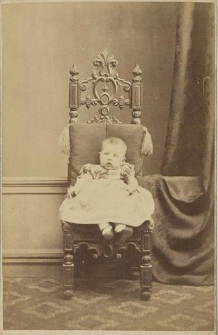 Artwork (Baby) this artwork made of Albumen photograph on paper mounted on card, created in 1870-01-01
