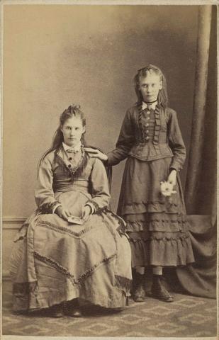 Artwork (Two young women) this artwork made of Albumen photograph on paper mounted on card, created in 1870-01-01