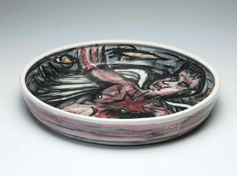Artwork Shallow bowl:  Spirit well this artwork made of Stoneware, wheelthrown buff clay with crimson, black, ochre and blue underglaze colours, created in 1990-01-01