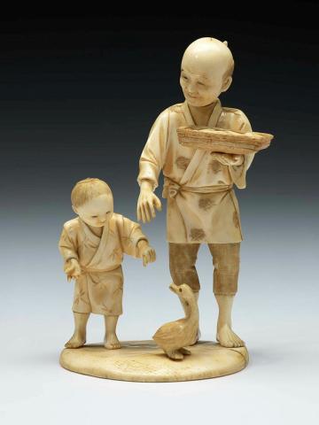 Artwork Sculpture:  (shell fish vendor, boy and duck) this artwork made of Ivory, carved, created in 1800-01-01
