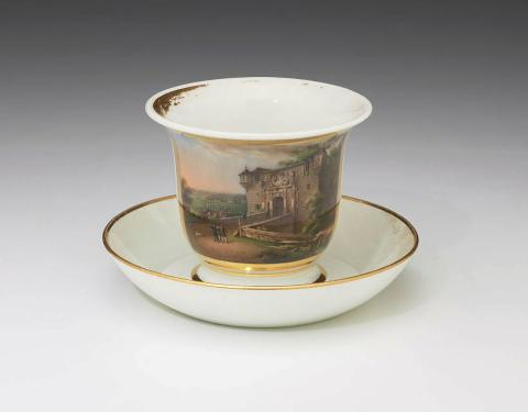 Artwork Cup and saucer this artwork made of White porcelain finely painted with a panel scene of Marburg with gilt borders. Married Wedgwood saucer, created in 1820-01-01