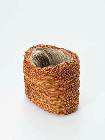 Artwork Guutu (vessel) 14 this artwork made of Woven spinifex (Triodia pungens), emu feathers, nylon thread and synthetic polymer fixative, created in 2001-01-01