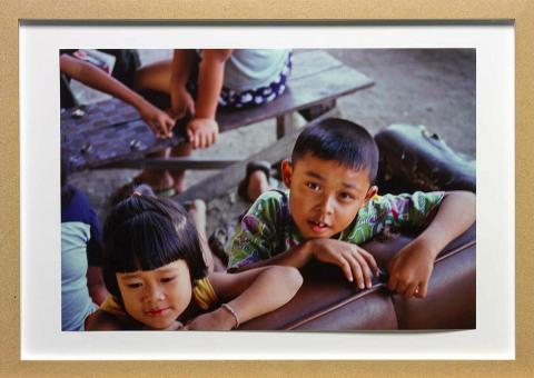 Artwork Untitled (children) this artwork made of Ultra-glossy type C photograph on paper in medium density fibreboard frame, created in 2000-01-01