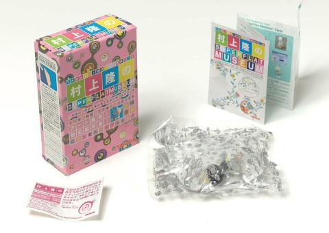 Artwork Mr. Oval and the Mediator / Black (from the 'SUPERFLAT MUSEUM' series by Takashi Murakami) this artwork made of Plastic figurine in pink cardboard box with leaflets, created in 2003-01-01