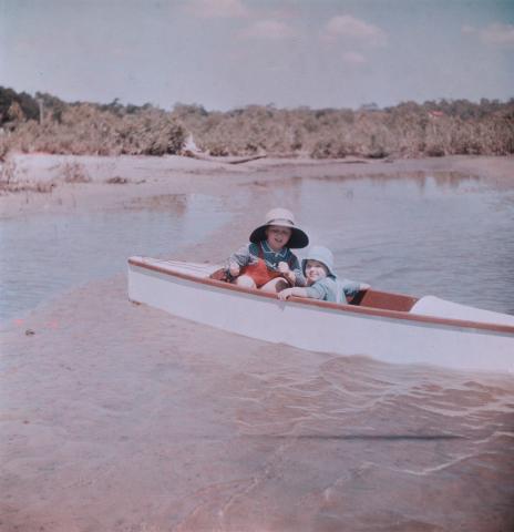 Artwork (Rosemary and Margaret in a canoe near mud flats) this artwork made of Cellulose acetate Dufay colour transparency (originally in a glass mount), created in 1935-01-01