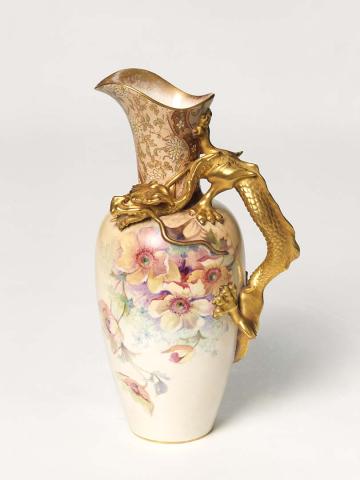 Artwork Vase with dragon handle this artwork made of Earthenware modelled with a handle in the form of a gilded dragon. Printed brown design to the neck hand-coloured. The body finely painted with single roses in overglaze colours. (Chine gilt style), created in 1891-01-01