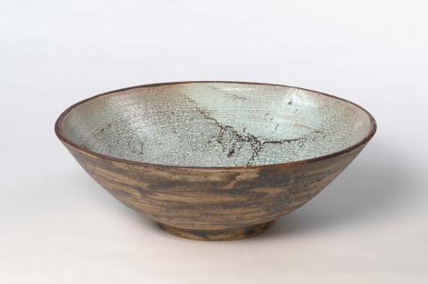 Artwork Bowl this artwork made of Stoneware, thrown with clay from Darra area. Interior glazed crackled turquoise, exterior brushed manganese, created in 1960-01-01