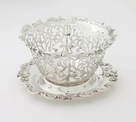 Artwork Basket and stand this artwork made of Silver, the bowl pierced with scroll motifs and cast scroll motifs on rim and edge of stand, created in 1841-01-01