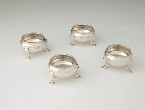 Artwork Four salt cellars this artwork made of Silver, flattened spherical bodies with cast feet, created in 1735-01-01