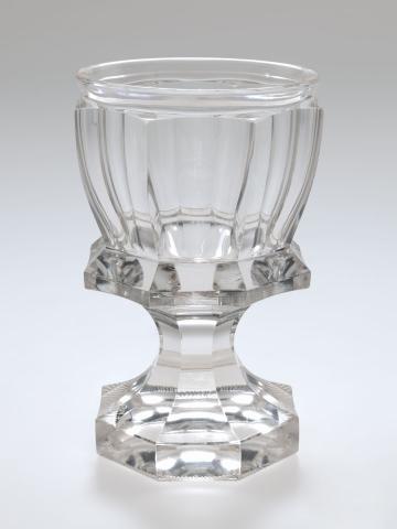 Artwork Goblet this artwork made of Clear glass wheelcut with eight facets and prominent ridge, created in 1840-01-01