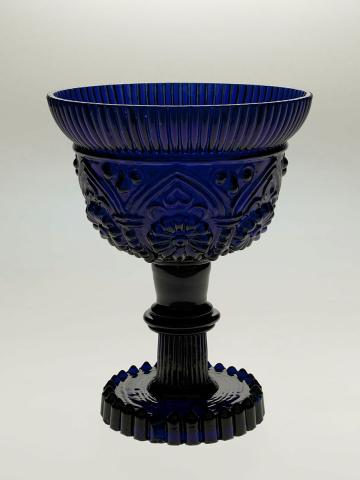 Artwork Goblet this artwork made of Cobalt glass moulded in the Moorish style with stylised daisies and arches, ridged rim, created in 1840-01-01