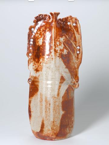 Artwork Vase:  Dance this artwork made of Stoneware, thrown and slab built with stencil decoration and Shino glaze.  Fired to 1300 degrees Celsius