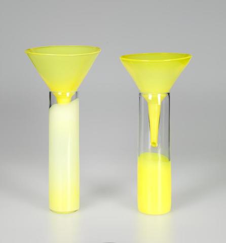 Artwork Cylinders and funnels this artwork made of Hot-worked clear glass shaded to opaque white and yellow, created in 1980-01-01