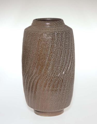 Artwork Jar this artwork made of Stoneware, thrown with fluted carved decoration and salt glaze