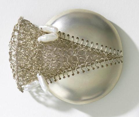 Artwork Brooch from the Ocean series this artwork made of Sterling silver repousse, crocheted silver wire and four Biwa (freshwater) pearls, created in 1979-01-01