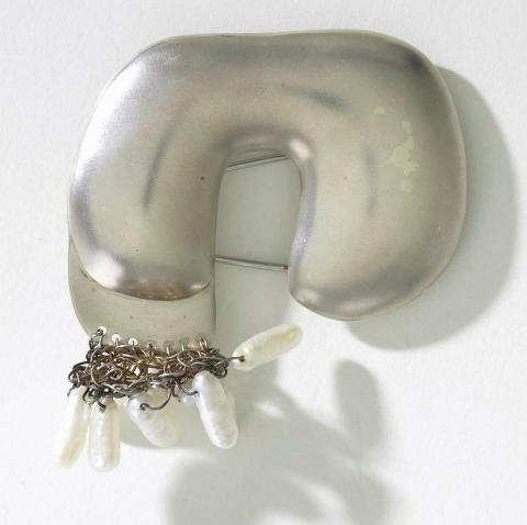 Artwork Brooch: from the Ocean series this artwork made of Sterling silver repousse, crocheted silver wire and nine Biwa (freshwater) pearls, created in 1979-01-01