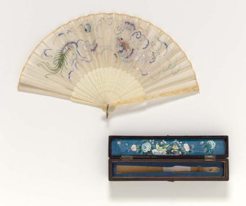 Artwork Fan this artwork made of Ivory guards with dragon embroidered on gauze with polychrome silks. Complete with black lacquered box, created in 1825-01-01