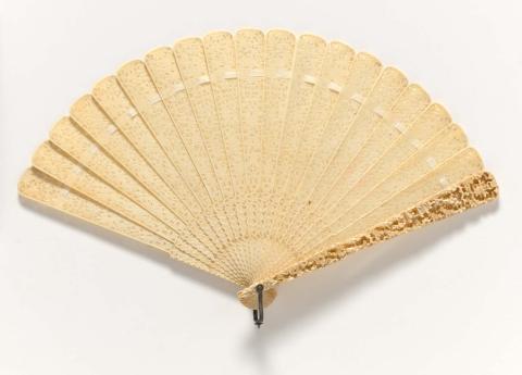 Artwork Fan this artwork made of Carved ivory guards with finely carved pierced ivory spokes, created in 1825-01-01